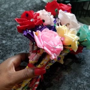 (12) scented bling rose pens
Made by December 
All